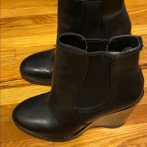 Black wedge boots
